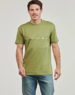 Calvin Klein Jeans - LOGO REPEAT TEE< T-shirts & Polos