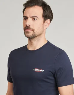 Guess T-shirts & Polos^- SS CN SLIM AMERICAN TR TEE