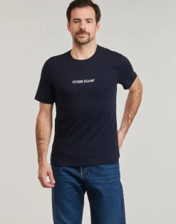 Guess - SS CN SLIM LOGO EMBRO TEE Marine Clearance