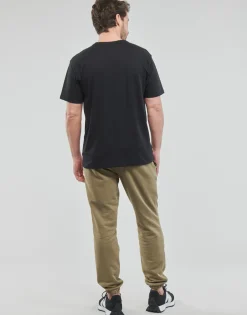 New Balance - ESSENTIALS LOGO T-SHIRT< T-shirts & Polos
