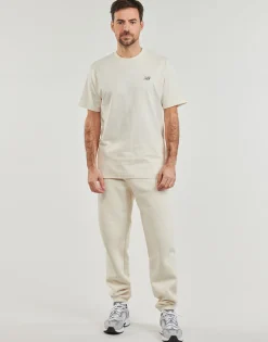 New Balance - FLEECE JOGGER< Joggings & Survêtements
