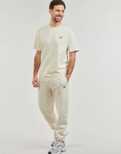 New Balance - FLEECE JOGGER< Joggings & Survêtements