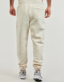 New Balance - FLEECE JOGGER< Joggings & Survêtements