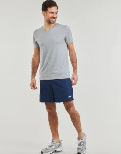 New Balance - NB WOVEN SHORT Bleu New