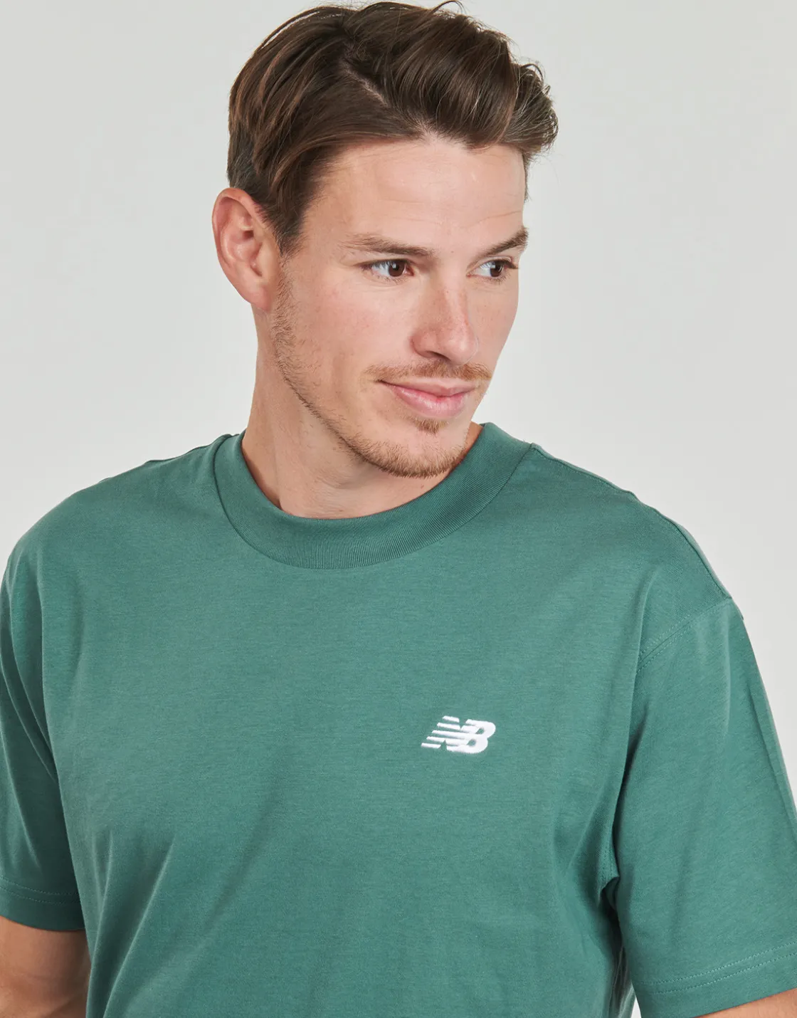 New Balance T-shirts & Polos^- SMALL LOGO JERSEY TEE