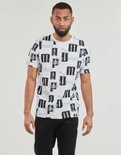 Puma T-shirts & Polos^- ESS+ LOGO LAB AOP TEE