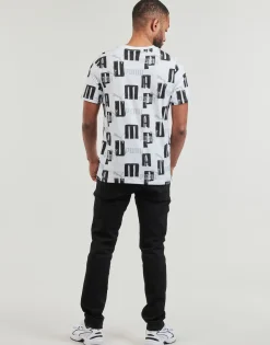 Puma T-shirts & Polos^- ESS+ LOGO LAB AOP TEE