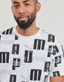 Puma T-shirts & Polos^- ESS+ LOGO LAB AOP TEE
